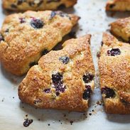 Bakery Style Blueberry Scones - crunchy sugaroutside, juicy blueberries + flaky tender inside. | pinchofyum.com