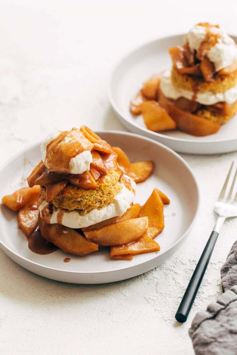 Pumpkin shortcakes with whipped cream and apples.