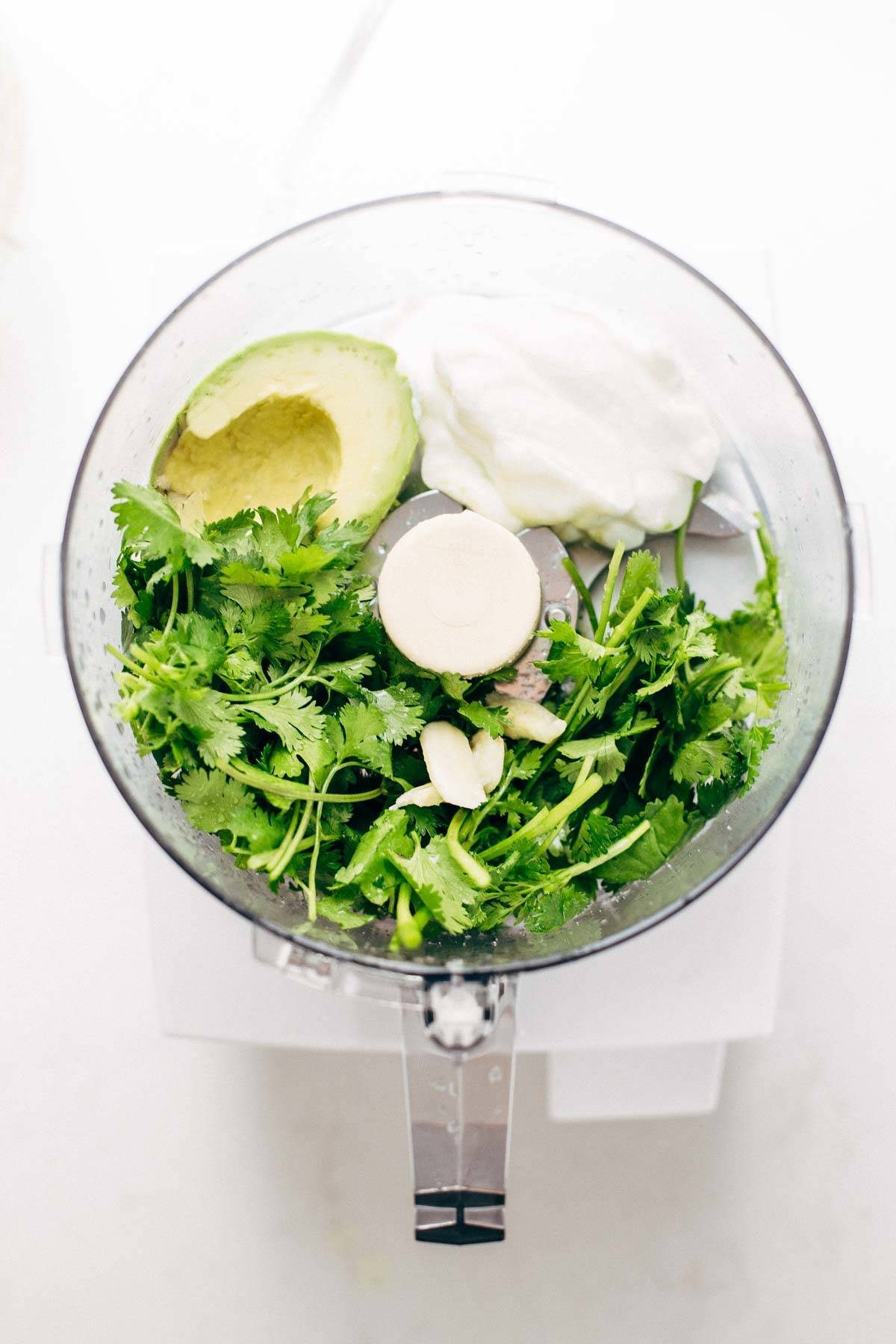 5 Minute Cilantro Avocado Dressing - made with easy ingredients like cilantro, avocado, Greek yogurt, garlic, and lime juice. | pinchofyum.com