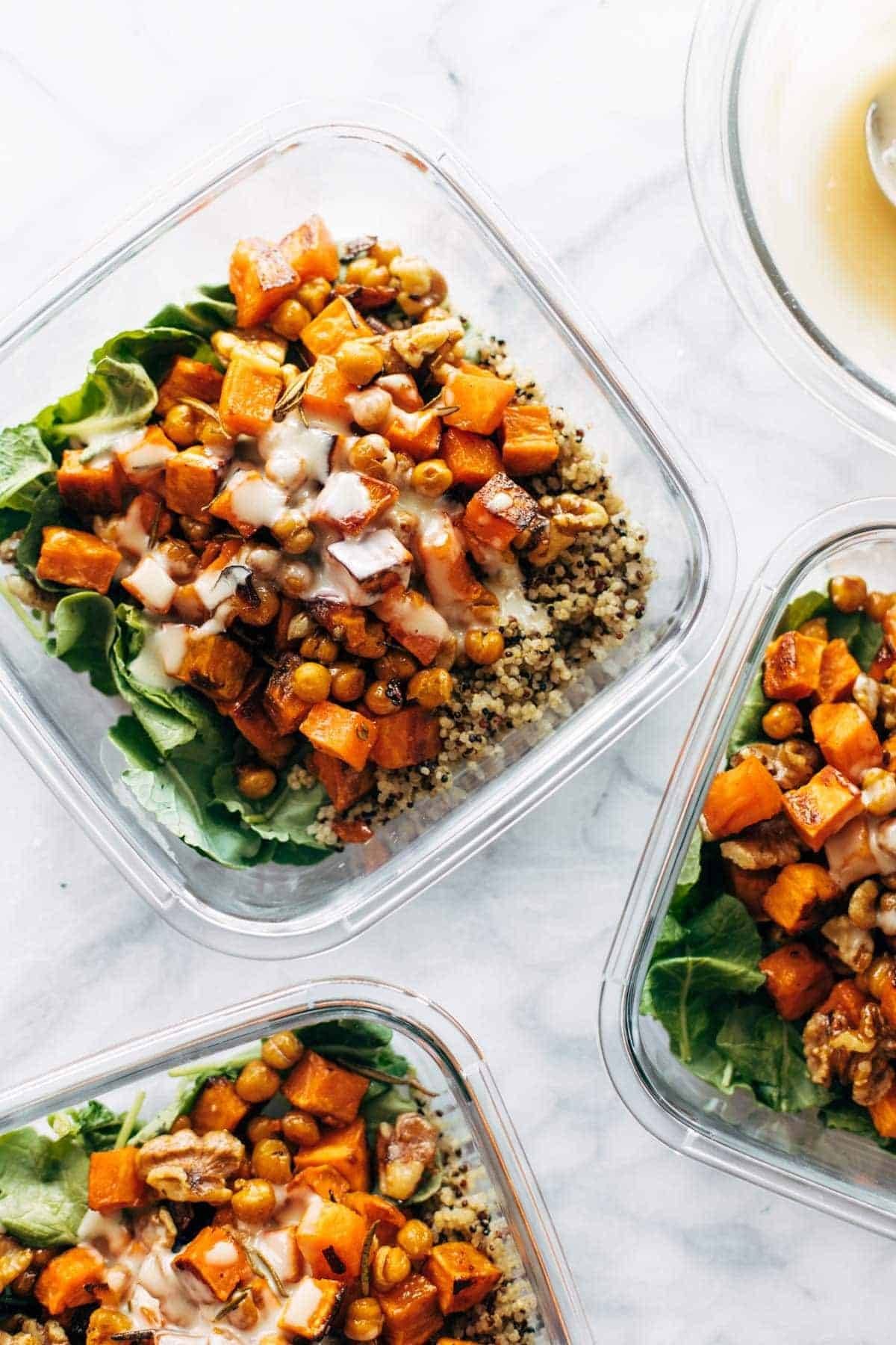 Quinoa sweet potato bowls in containers.